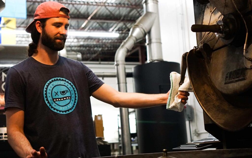 Jeff Mooney roasts coffee at Folly Coffee.