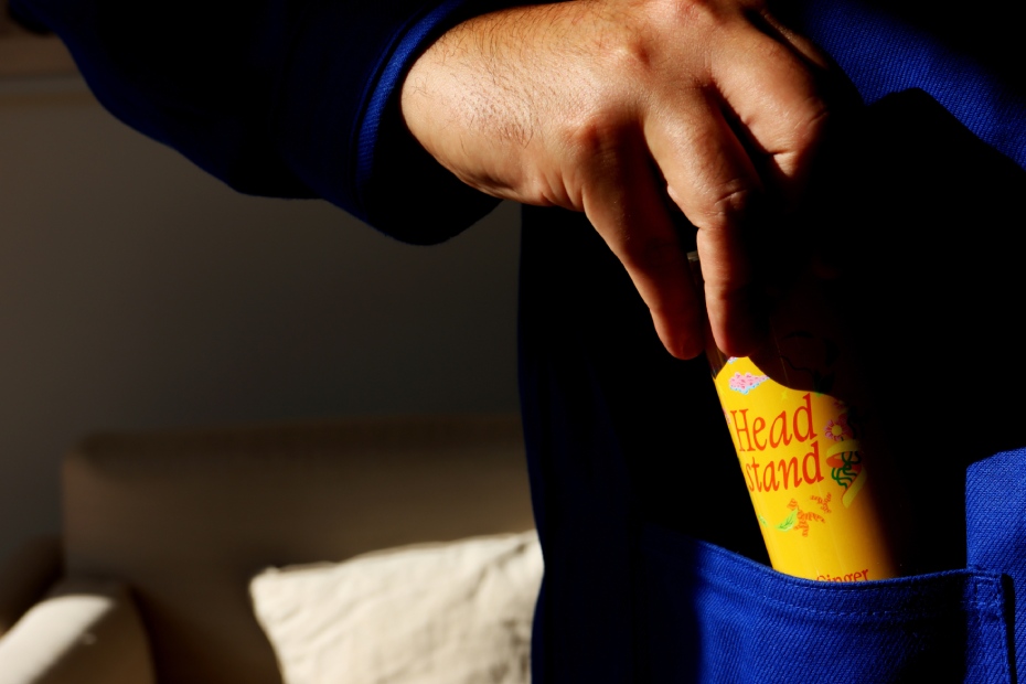 A can of Headstand in a pocket.