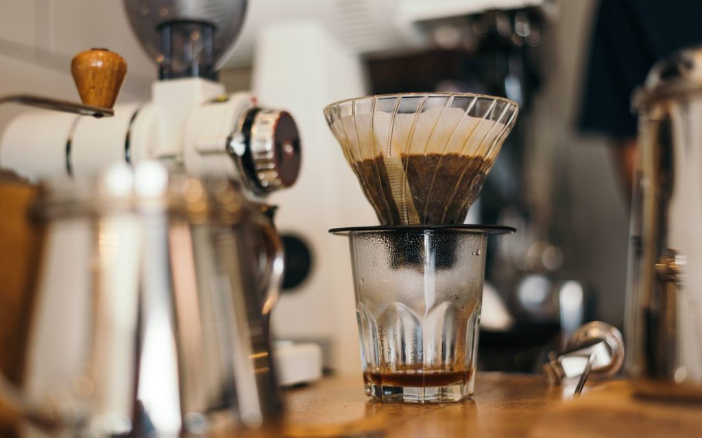 Brewing pour over coffee at a café.