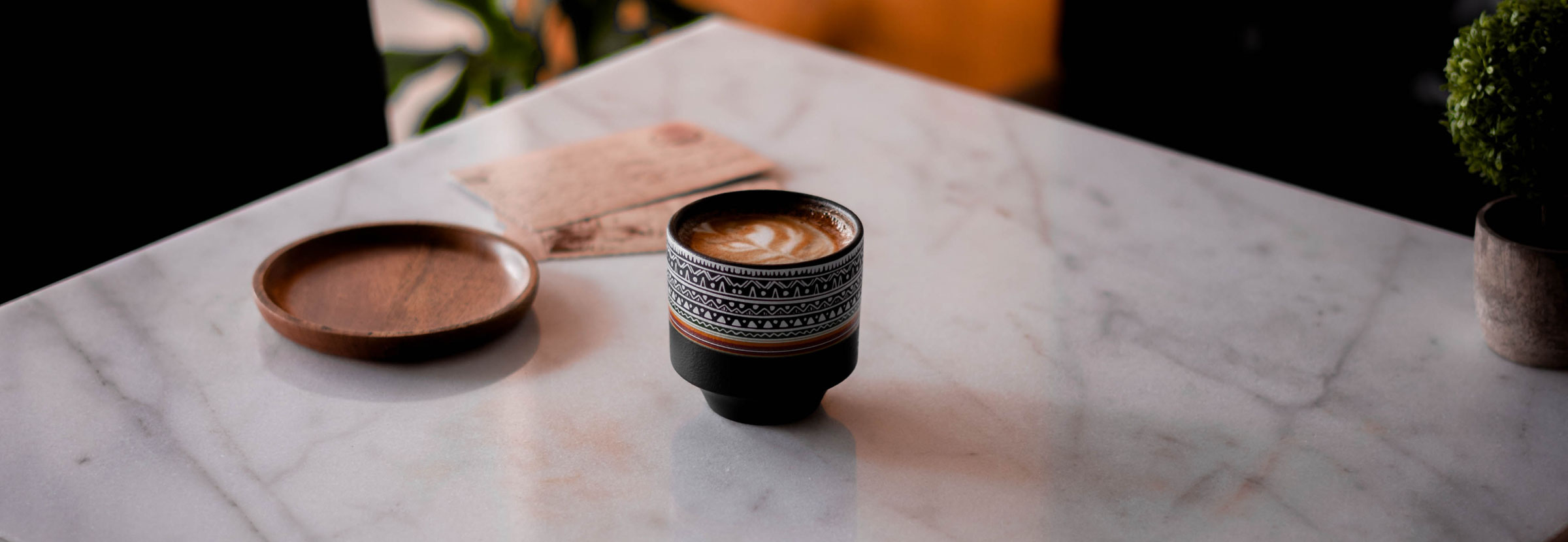 A cup of coffee served at a Saudi Arabian coffee shop.