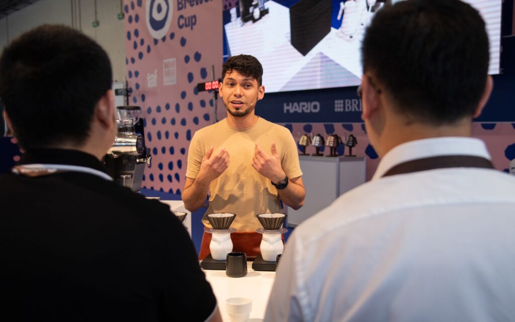 Carlos Medina presents to the judges at the 2023 World Brewers Cup.